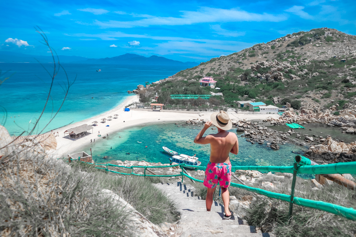 Twin beach and rocky cliffs of Hon Noi (Yen Island) in Nha Trang